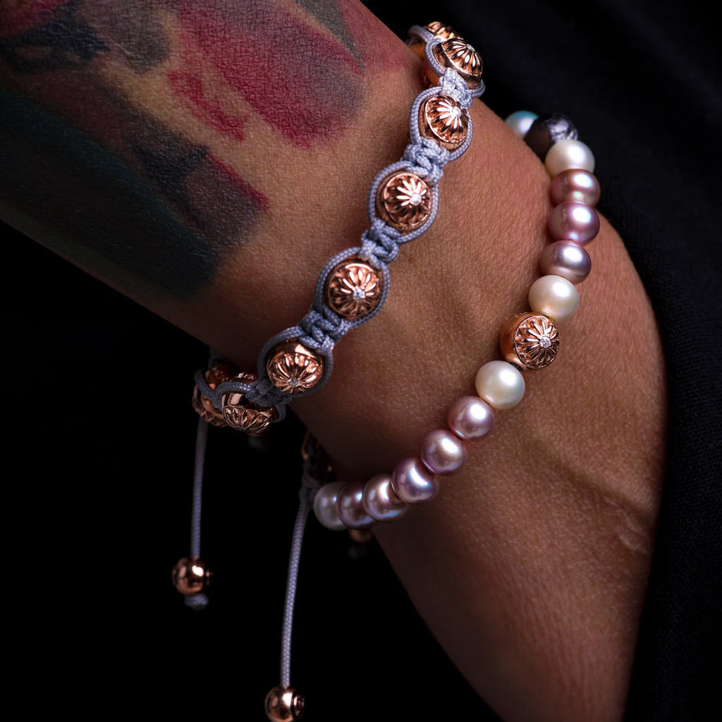 woman wearing rose gold shamballa bracelet with grey string and 8mm round beads - the maverick 