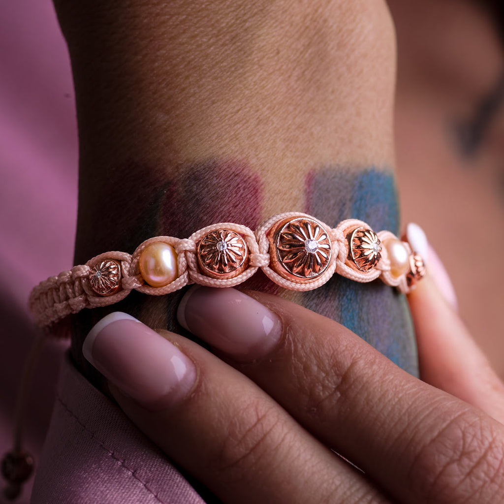 close look at the sakura polaris rose gold macrame braided bracelet