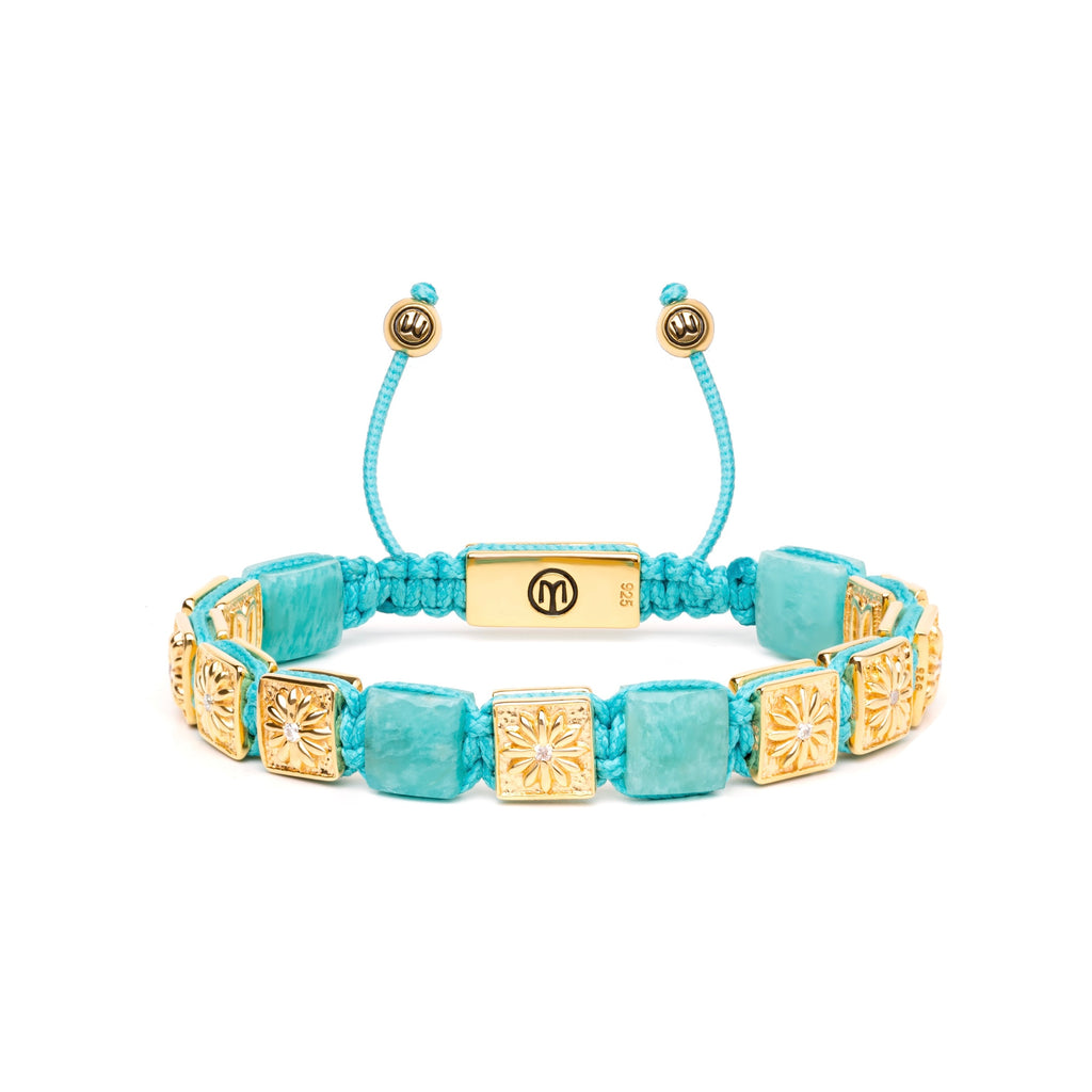 gold macrame bracelet with turquoise string and amazonites on a white background 