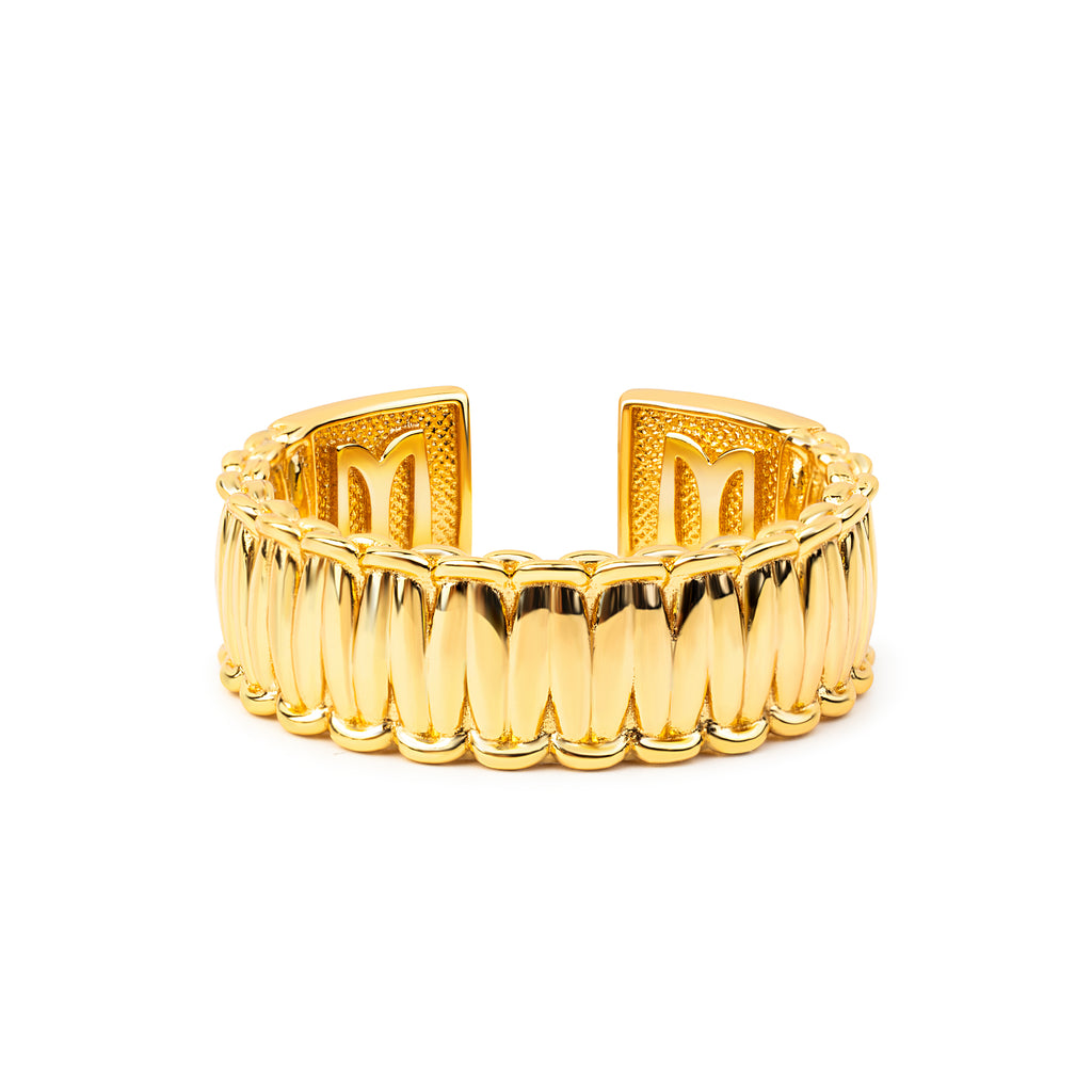 Gold ring on a white background