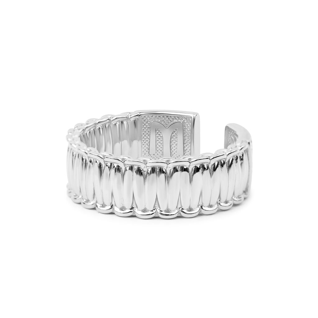 Silver cuff ring on a white background