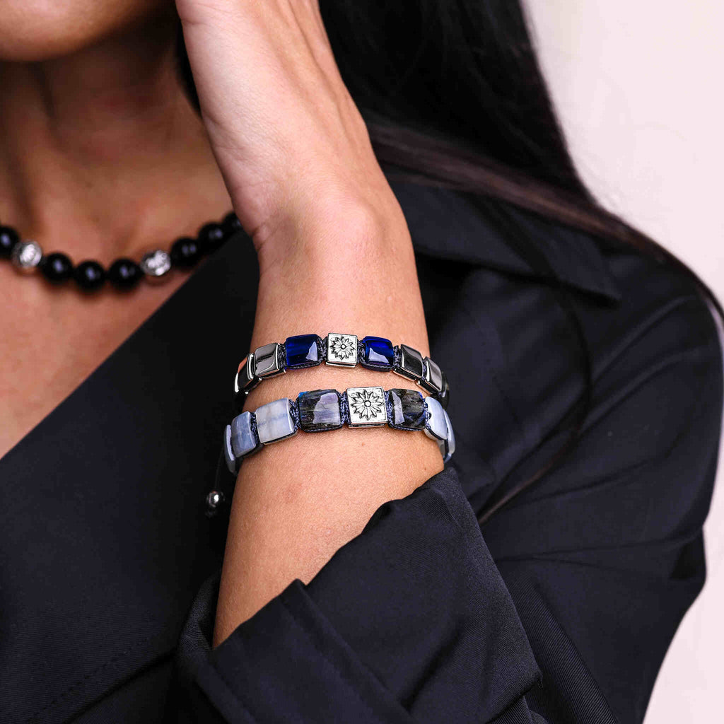 woman wearing shamballa bracelets with blue sapphires and moon stones - Mahigan bracelets 