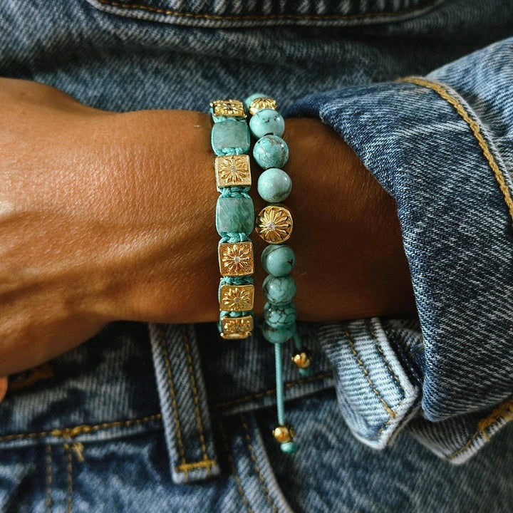 woman with denim clothing wears turquoise macrame bracelets with gold - mahigan jewelry 